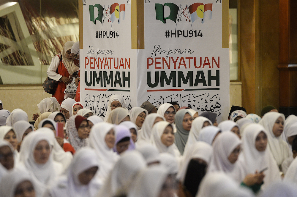 PAS-Umno supporters attend Himpunan Penyatuan Ummah (Muslim Unity Rally) at Putra World Trade Centre in Kuala Lumpur September 13, 2019. — Picture by Miera Zulyana
