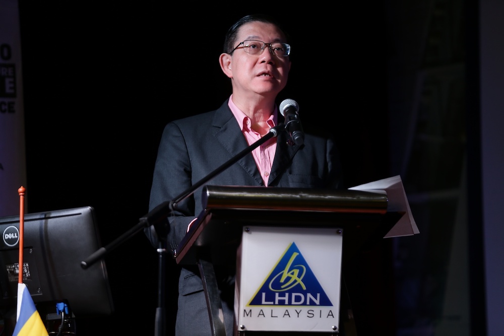 Finance Minister Lim Guan Eng delivers his keynote address during the Special Voluntary Disclosure Programme in Petaling Jaya September 16, 2019. u00e2u20acu201d Picture by Ahmad Zamzahuri