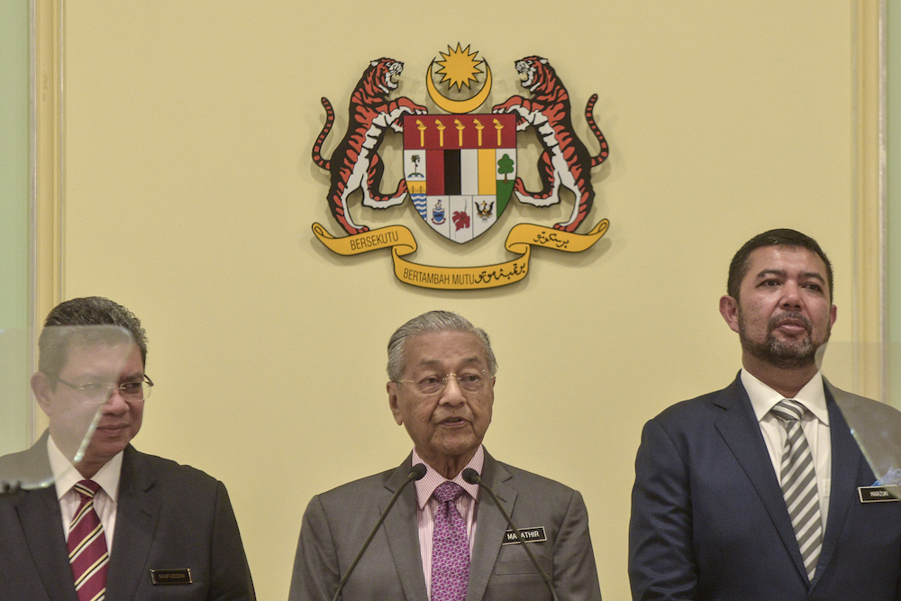 Datuk Saifuddin Abdullah, Tun Dr Mahathir Mohamad and Senator Marzuki Yahya attend the launch of the u00e2u20acu02dcForeign Policy Framework of the New Malaysiau00e2u20acu2122 at the Prime Minister's Office in Putrajaya September 18, 2019. u00e2u20acu201d Picture by Shafwan Zaidon
