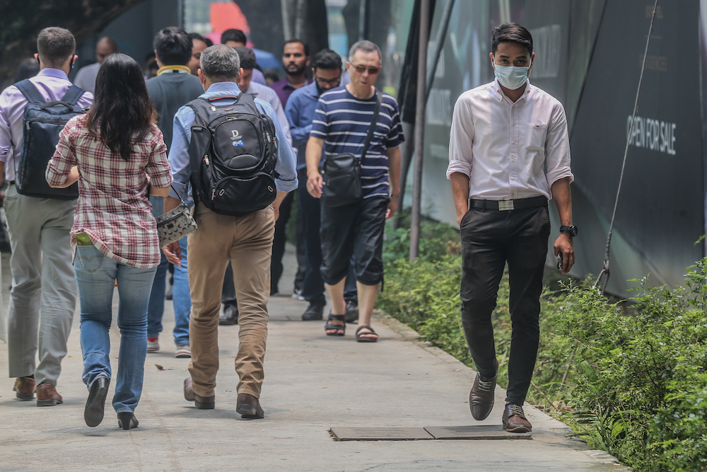 Malaysia’s working-age population is around 23.3 million people with 16.0 million in the workforce and 7.3 million outside of the workforce. — Picture by Firdaus Latif