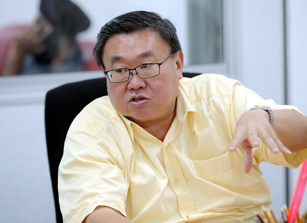 Kampar MP Thomas Su said instead of letting Kampar District Council to capture strays, his office was working to contain its population. — Picture by Farhan Najib