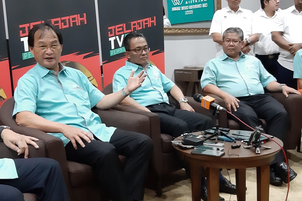 Works Minister Baru Bian (left) speaking to reporters during a press conference in Kuching September 21, 2019. u00e2u20acu201d Picture by Sulok Tawie'