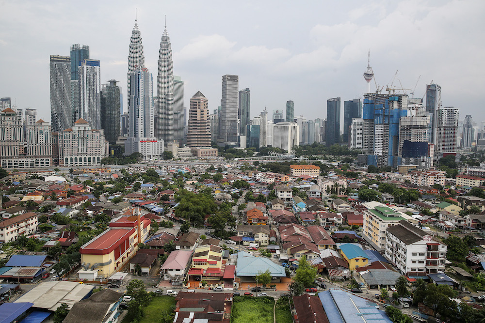 Aerial view of Kampung Baru which sits right next to some of Kuala Lumpur's skyscrapers. u00e2u20acu201d Picture by Yusof Mat Isa