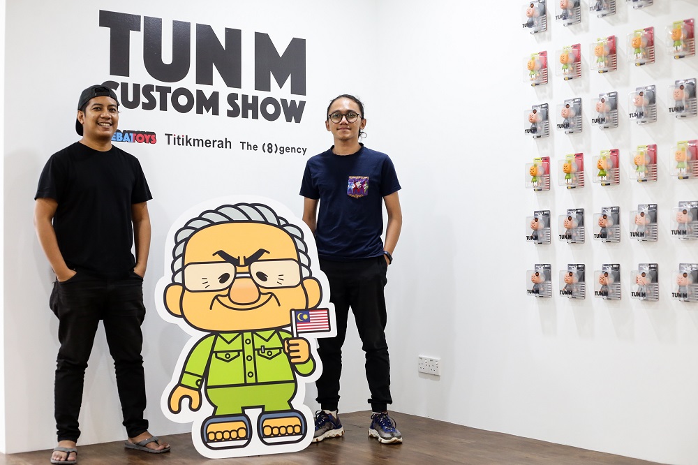 Titikmerah Collectiveu00e2u20acu2122s co-founders Ajim Juxta and Aleff Ahmad at the u00e2u20acu02dcTun M Custom Showu00e2u20acu2122 by HebatToys and TitikMerah at the TitikMerah Gallery in Kuala Lumpur September 25, 2019. u00e2u20acu201d Picture by Ahmad Zamzahuri