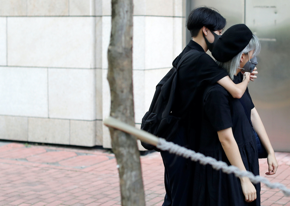 Protesters gather to support forty-four protesters who have been charged with rioting over their actions during a major protest on July 28 and are to stand trial at the Eastern Magistrates' Court in Kowloon, Hong Kong September 25, 2019. u00e2u20acu201d Reuters pic