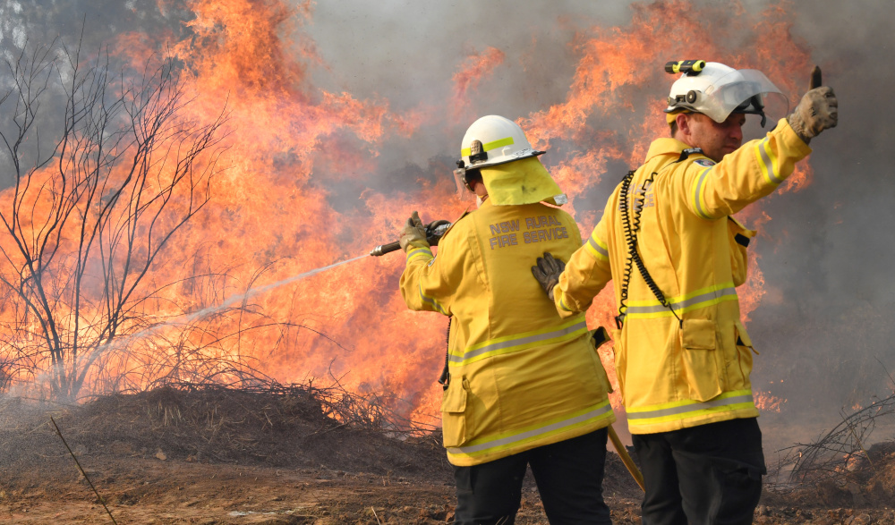 New South Wales Rural Fire Service firefighters are seen fighting fires on Long Gully Road in the northern New South Wales town of Drake, Australia, September 9, 2019. u00e2u20acu201d AAP Image/Darren England via Reuters 