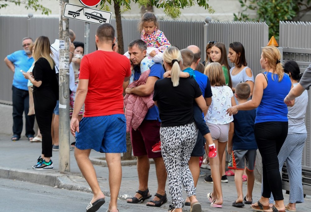 Residents gather outdoors in Tirana on September 21, 2019, after two earthquakes above 5.0 magnitude struck the coastline Adriatic coastline of Albania. u00e2u20acu201d AFP pic