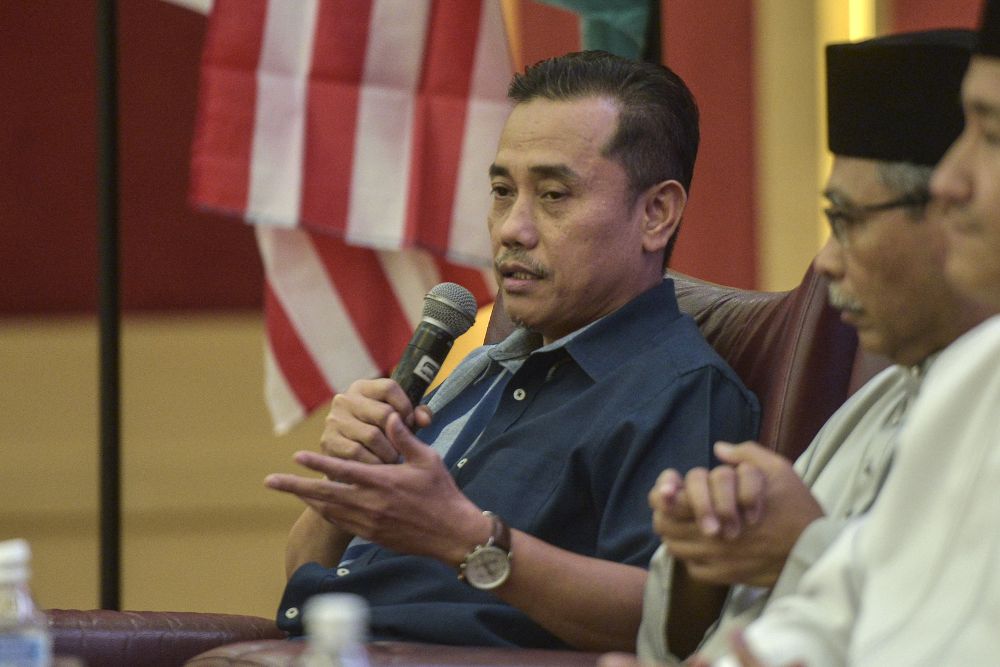 Gerakan Pembela Ummah chairman Aminuddin Yahaya speaks during a forum at Himpunan Penyatuan Ummah (Muslim Unity Rally) held at the Putra World Trade Centre in Kuala Lumpur September 13, 2019. u00e2u20acu201d Picture by Shafwan Zaidon