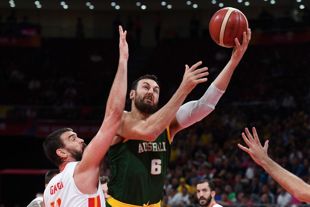 Australiau00e2u20acu2122s Andrew Bogut (right) goes for the basket as Spainu00e2u20acu2122s Marc Gasol tires to block during the Basketball World Cup semi-final game between Australia and Spain in Beijing on September 13, 2019. u00e2u20acu201d AFP pic