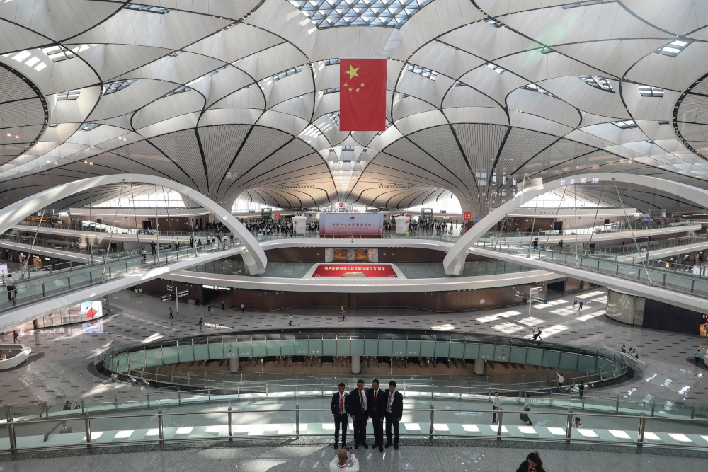 People take photos before a launch ceremony at the new Beijing Daxing International Airport in Beijing September 25, 2019. u00e2u20acu201d AFP pic 