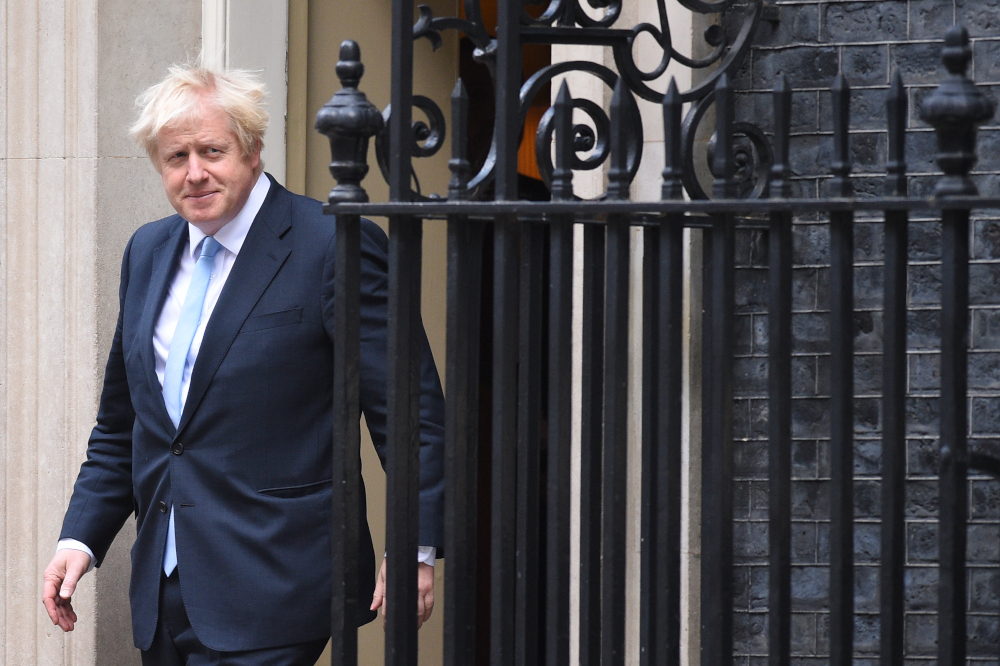 Britainu00e2u20acu2122s Prime Minister Boris Johnson comes out to greet US Vice-President Mike Pence outside 10 Downing Street in central London September 5, 2019. u00e2u20acu201d AFP pic