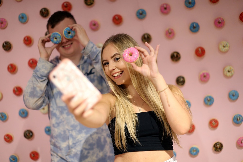 Visitors take and pose for u00e2u20acu02dcselfieu00e2u20acu2122 photographs at The Selfie Factory in Westfield London shopping centre in west London September 11, 2019. u00e2u20acu201d AFP pic         