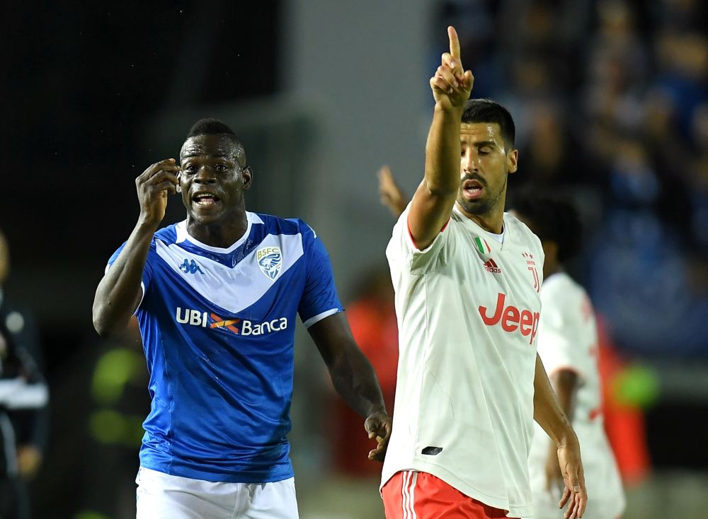 Brescia's Mario Balotelli in action with Juventus' Sami Khedira. u00e2u20acu201d Reuters pic