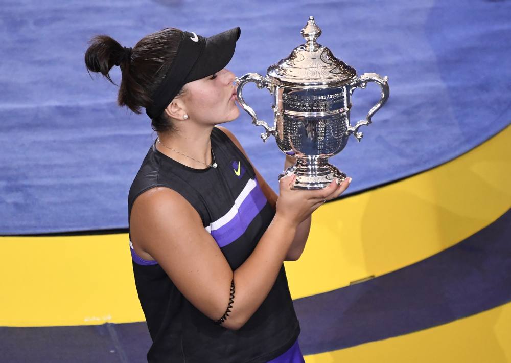 Canadau00e2u20acu2122s Bianca Andreescu poses with the trophy after beating Serena Williams in the 2019 US Open tennis tournament in New York September 7, 2019. u00e2u20acu2022 Picture by Danielle Parhizkaran-USA TODAY Sports via Reuters