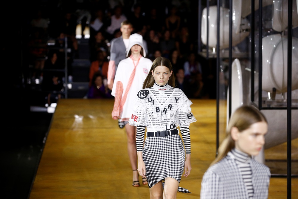 Models present creations during the Burberry catwalk show at London Fashion Week in London September 16, 2019. — AFP pic          