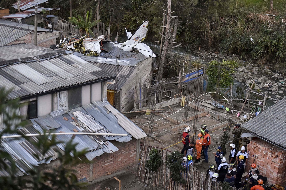 Rescuers work at the site where a plane crashed at the Junin neighbourhood in Popayan, southwestern Colombia September 15, 2019. u00e2u20acu201d AFP pic    
