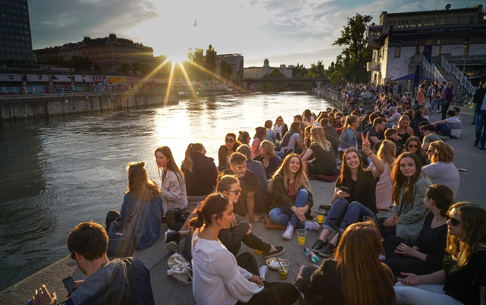 In this file photo taken on May 5, 2017, people enjoy late afternoon near the Danube canal in Vienna, Austria. u00e2u20acu201d AFP pic  