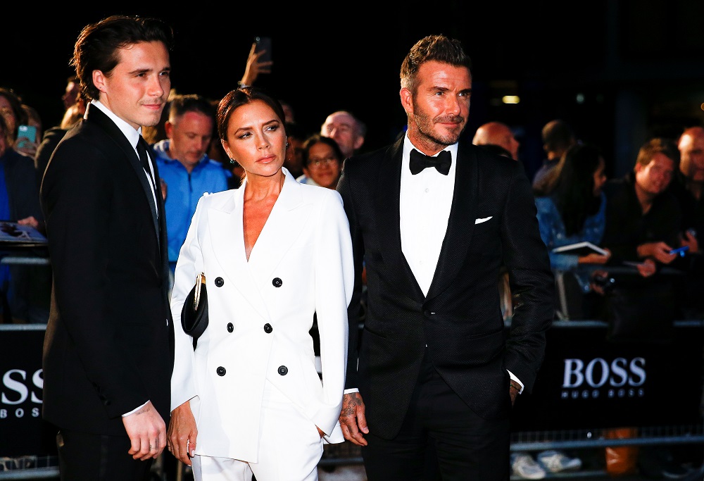 David Beckham, his wife Victoria Beckham and one of their sons, Brooklyn Beckham arrive to the GQ Men of The Year Awards 2019 in London September 3, 2019. u00e2u20acu201d Reuters pic
