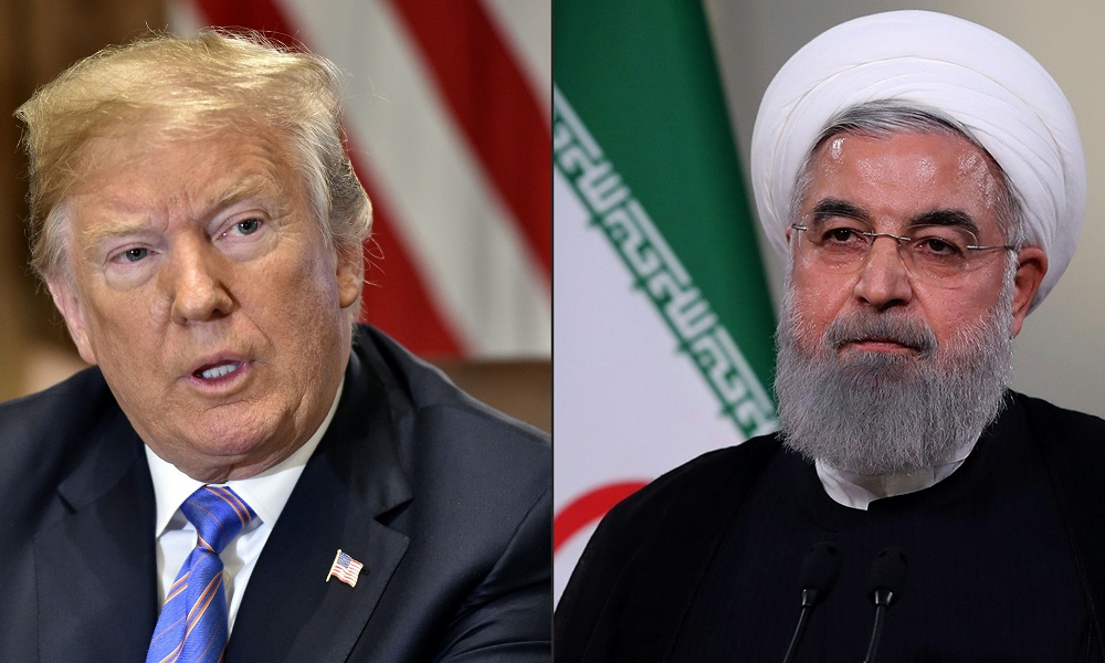 This combination of file pictures created on July 23, 2018 shows US President Donald Trump during a cabinet meeting and Iranian President Hassan Rouhani giving a speech on Iranian TV. u00e2u20acu201d HO/Iranian presidency/AFP pic     