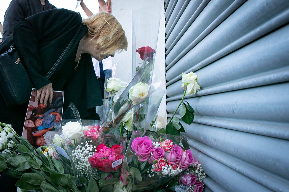 Johannau00e2u20acu2122s mother brings flower where her daughter has been killed during a rally to denounce femicides and domestic violence in Le Havre, northwestern France September 18, 2019. u00e2u20acu201d AFP pic 