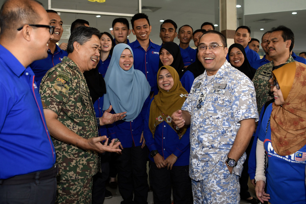 Navy chief Admiral Datuk Mohd Reza Mohd Sany chats with the Starlight 3 Operation team during a reception to welcome them home in Kuala Lumpur September 5, 2019. u00e2u20acu201d Bernama pic