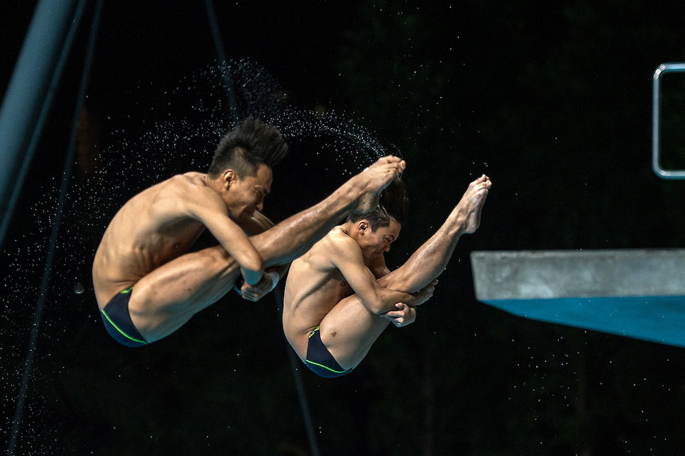 Malaysiau00e2u20acu2122s Muhd Syafiq Puteh (left) and Gabriel Gilbert execute an u00e2u20acu02dcInward 1 1/2 Somersaultu00e2u20acu2122 during the 3m Springboard Menu00e2u20acu2122s Finals during the 2019 Asian Diving Cup at the National Aquatic Centre in Bukit Jalil September 6, 2019. u00e2u20acu201d Bernama pic