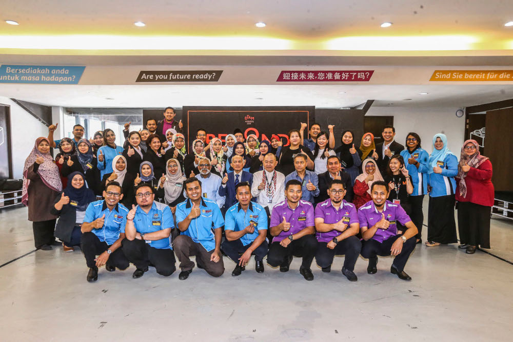 Participants of the storytelling session together with the panel of judges at d.school Malaysia office. — Picture by Hari Anggara