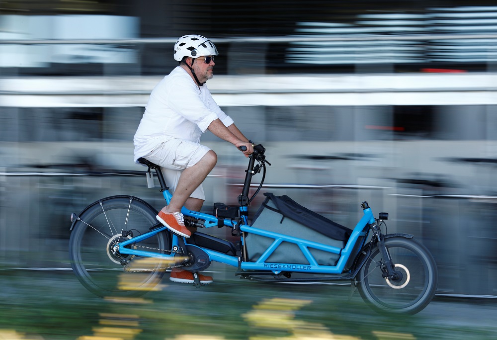 A employee of electric bicycle manufacturer Riese & Mueller drives an electric cargo bike in Muehltal near Darmstadt, Germany August 30, 2019. u00e2u20acu201d Reuters pic