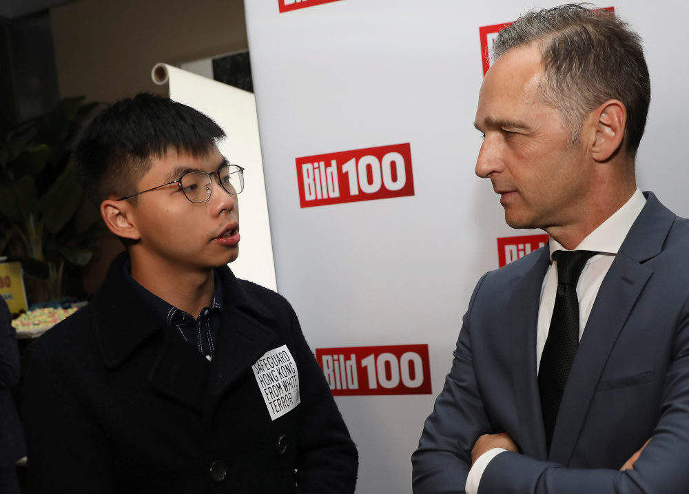 Hong Kong pro-democracy activist Joshua Wong and German Foreign Minister Heiko Maas attend the the summer party u00e2u20acu02dcBild 100u00e2u20acu2122 of German publisher Axel Springer at the Reichstag building in Berlin, Germany, September 9, 2019. u00e2u20acu201d Reuters pic 