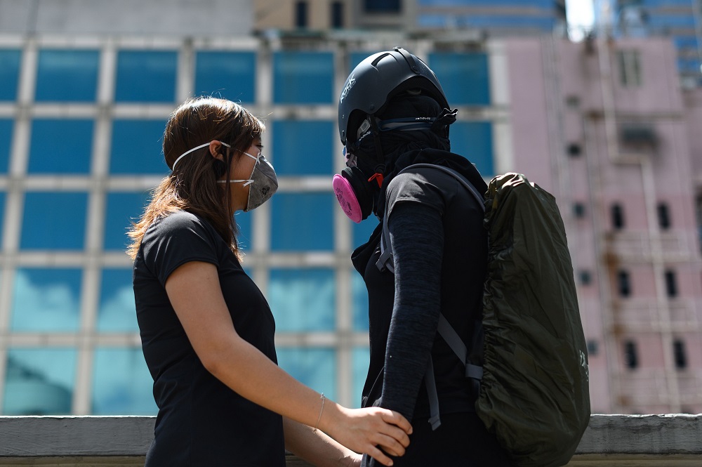 This picture taken on September 6, 2019 shows 24-year-old Hong Kong woman u00e2u20acu02dcJaneu00e2u20acu2122 (left) posing with her girlfriend following an interview with AFP in Hong Kong. u00e2u20acu201d AFP pic           