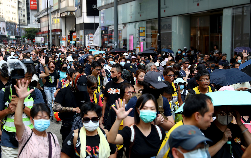 Anti-government protesters wearing masks attend a protest in Causeway Bay district, in Hong Kong, China October 5, 2019. u00e2u20acu2022 Reuters picnn