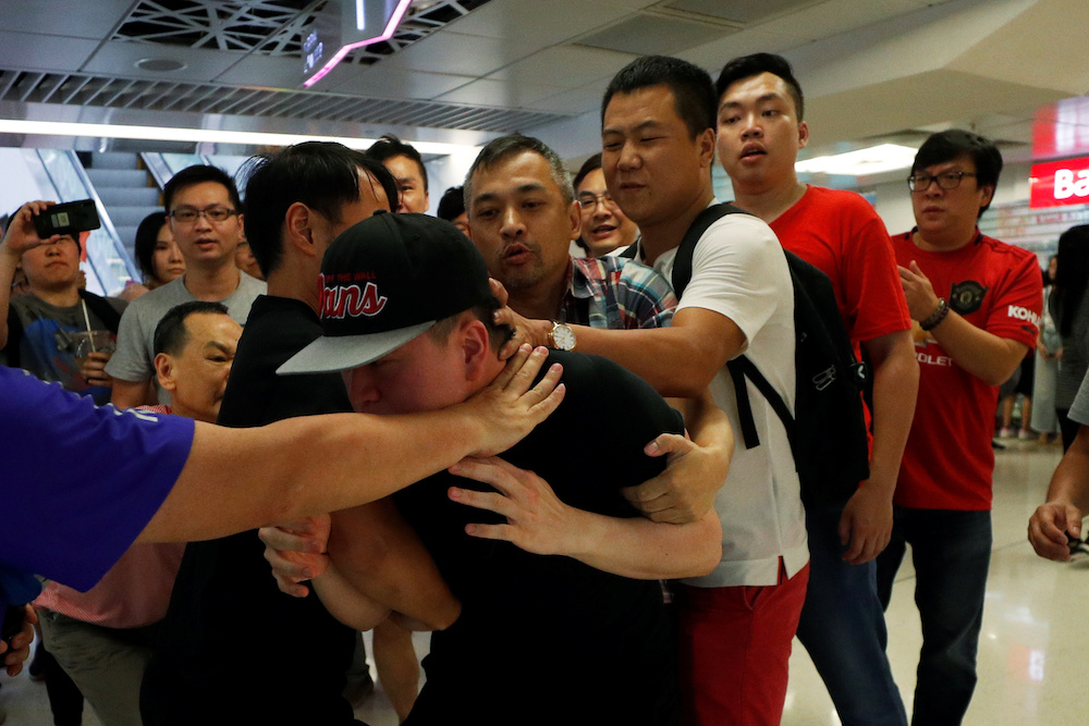Pro-China demonstrators and anti-government protester scuffle at Amoy Plaza shopping mall in Kowloon Bay, Hong Kong, China, September 14, 2019. u00e2u20acu201d Reuters picnn
