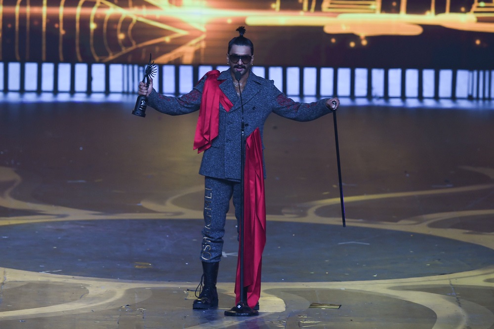 Bollywood actor Ranveer Singh reacts after receiving the Best Performance in a Leading Role — Male award for his movie ‘Padmaavat’ during the 20th International Indian Film Academy (IIFA) Awards at NSCI Dome in Mumbai September 18, 2019. — AFP pic