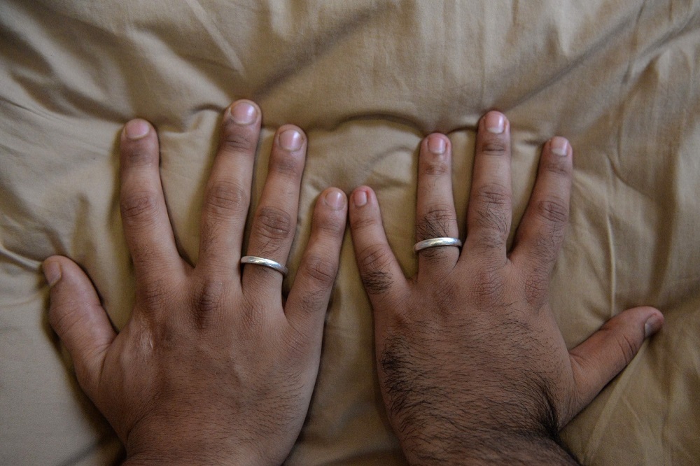 Indian gay married couple Vishwa Srivastava (right) and Vivek Kishore (left) show their wedding rings in Gurgaon on the outskirts of New Delhi September 1, 2019. u00e2u20acu201d AFP pic