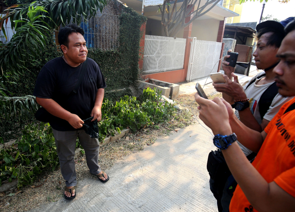 Indonesian journalist and documentary filmmaker Dandhy Laksono is interviewed by reporters after he was named as a suspect and charged with violating the countryu00e2u20acu2122s online hate speech laws in Bekasi, West Java province, Indonesia, September 27, 2019. u00e2u20acu201d