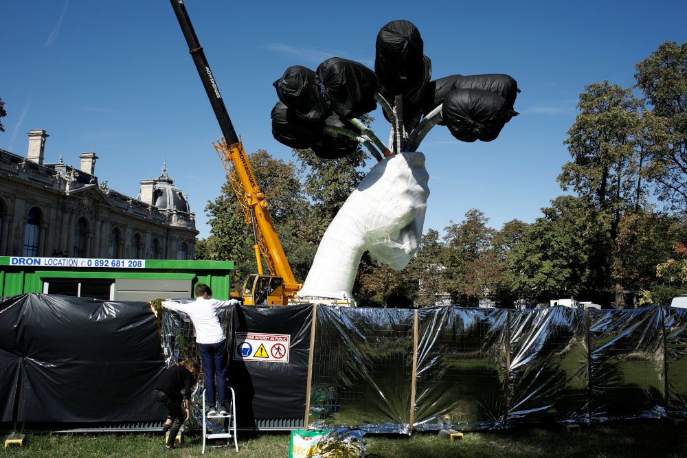 The sculpture u00e2u20acu02dcBouquet of Tulipsu00e2u20acu2122 by US artist Jeff Koons is seen covered by plastic during its installation near the Petit Palais museum in Paris, France, September 11, 2019. u00e2u20acu201d Reuters pic 