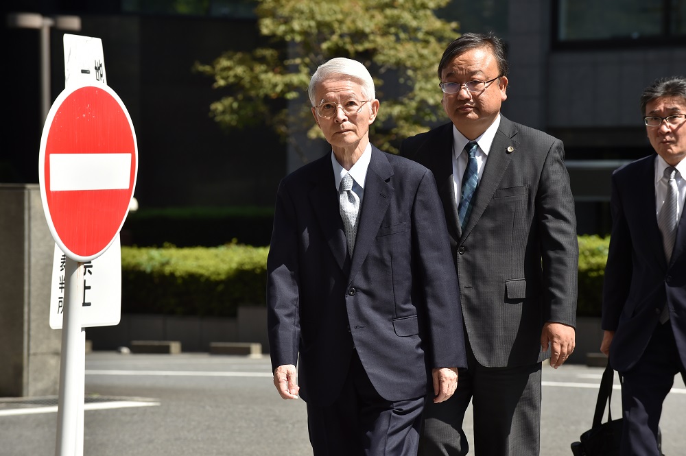 Tsunehisa Katsumata (left), former chairman of Tokyo Electric Power Company, the firm that operated the Fukushima plant, arrives at the Tokyo District Court in Tokyo September 19, 2019. u00e2u20acu201d AFP pic       