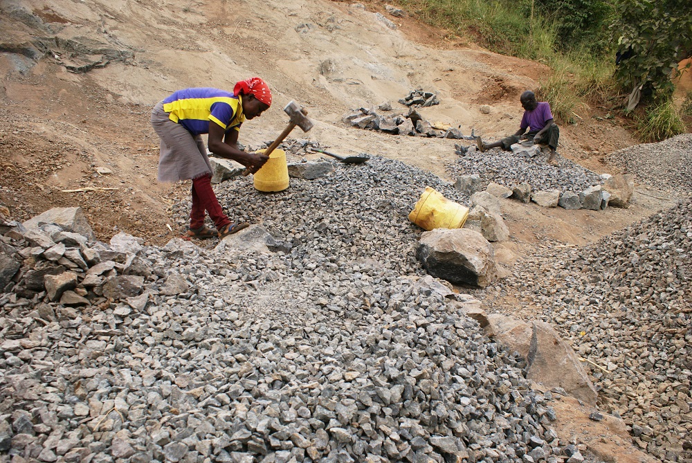 A woman works at a quarry in Muiru village, central Kenya July 16, 2019. u00e2u20acu201d Thomson Reuters Foundation pic