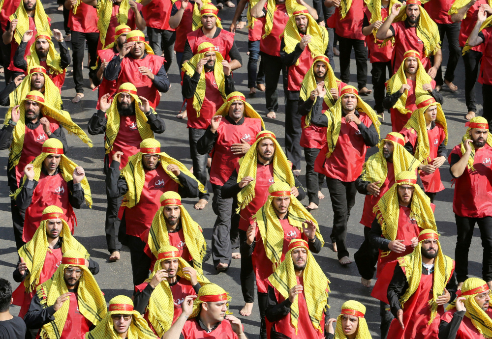 Lebanonu00e2u20acu2122s Hezbollah supporters gesture as they attend a religious procession to mark the Shiu00e2u20acu2122ite Ashura ceremony, in Beirut, Lebanon September 10, 2019. u00e2u20acu201d Reuters pic 
