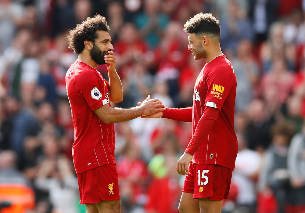 Liverpoolu00e2u20acu2122s Mohamed Salah and Alex Oxlade-Chamberlain after the match against Newcastle at the Anfield Stadium in Liverpool on September 14, 2019. u00e2u20acu201d Reuters pic