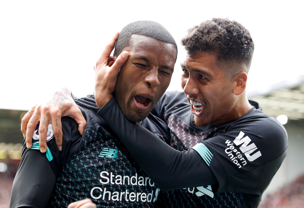 Liverpoolu00e2u20acu2122s Georginio Wijnaldum celebrates scoring their first goal with Roberto Firmino against Sheffield United at Bramall Lane in Sheffield, September 28, 2019. u00e2u20acu201d Reuters pic
