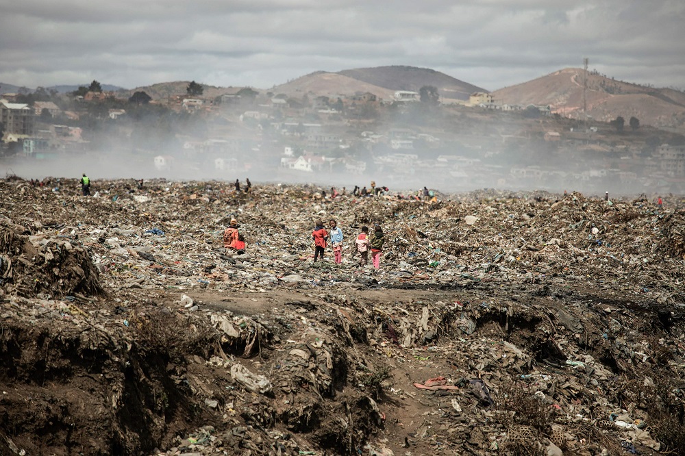 Children and waste pickers work through garbage at one of the municipal landfill by the Father Opekau00e2u20acu2122s association Akamasoa on the outskirts of Antananarivo July 24, 2019. u00e2u20acu201d AFP pic         