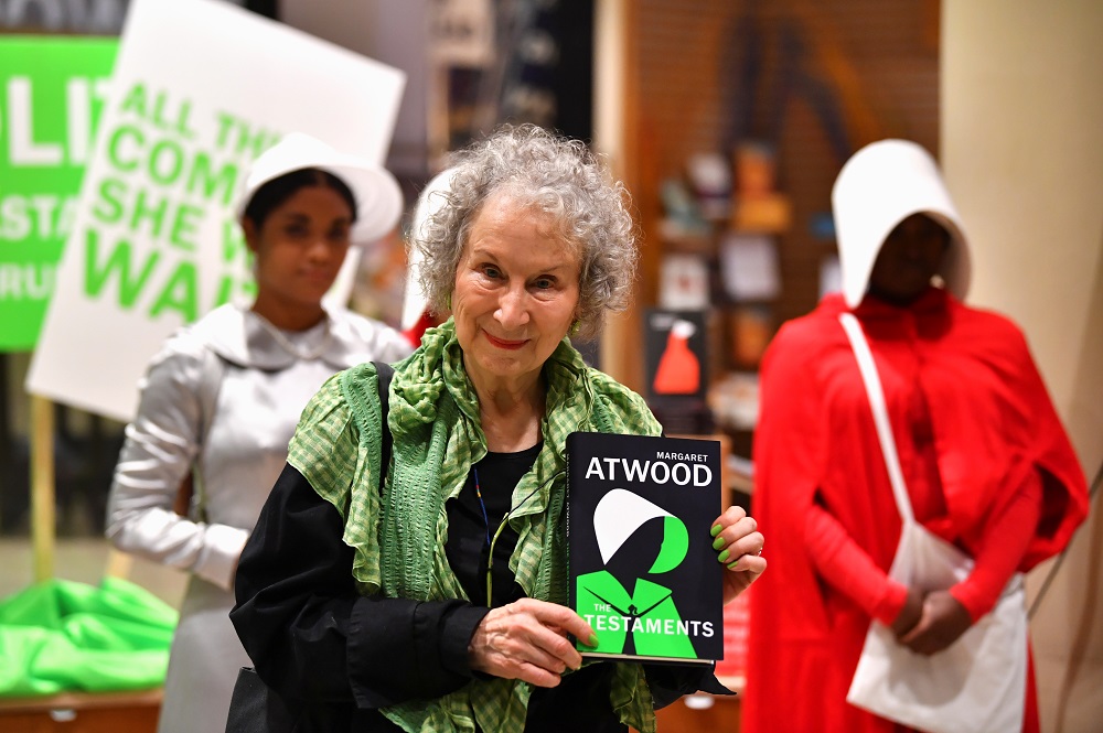 Author Margaret Atwood holds her new novel u00e2u20acu02dcThe Testamentsu00e2u20acu2122 during the launch at a book store in London September 10, 2019. u00e2u20acu201d Reuters pic 