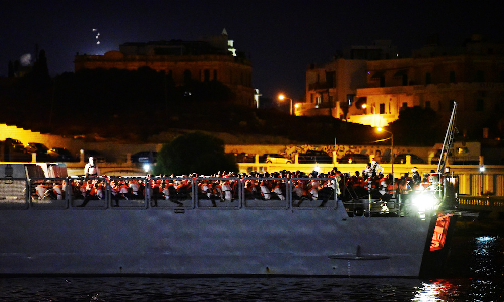 Migrants from the Ocean Viking ship which has been drifting in the Mediterranean for two weeks are brought to shore by the Armed forces of Malta, to a port in Malta August 23, 2019. u00e2u20acu201d Reuters picnn