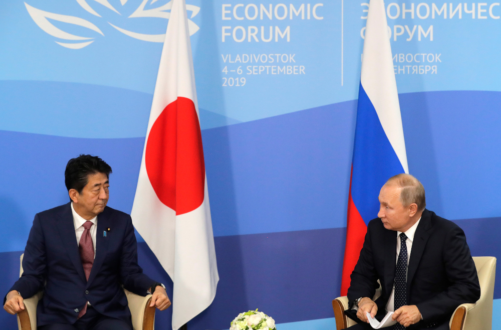 Russian President Vladimir Putin and Japanu00e2u20acu2122s Prime Minister Shinzo Abe speak during their meeting at the Eastern Economic Forum in Vladivostok September 5, 2019. u00e2u20acu201d AFP pic 
