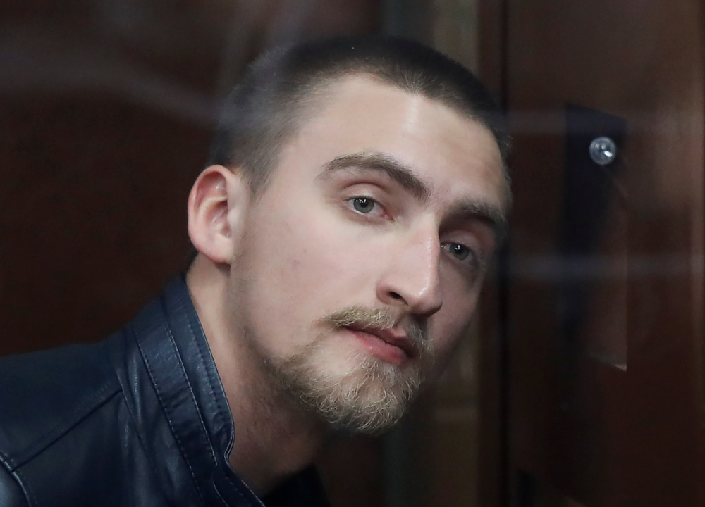 Defendant Pavel Ustinov, accused of using violence against a police officer during an unauthorised rally to demand free elections, attends a court hearing in Moscow, Russia September 16, 2019. u00e2u20acu201d Reuters pic