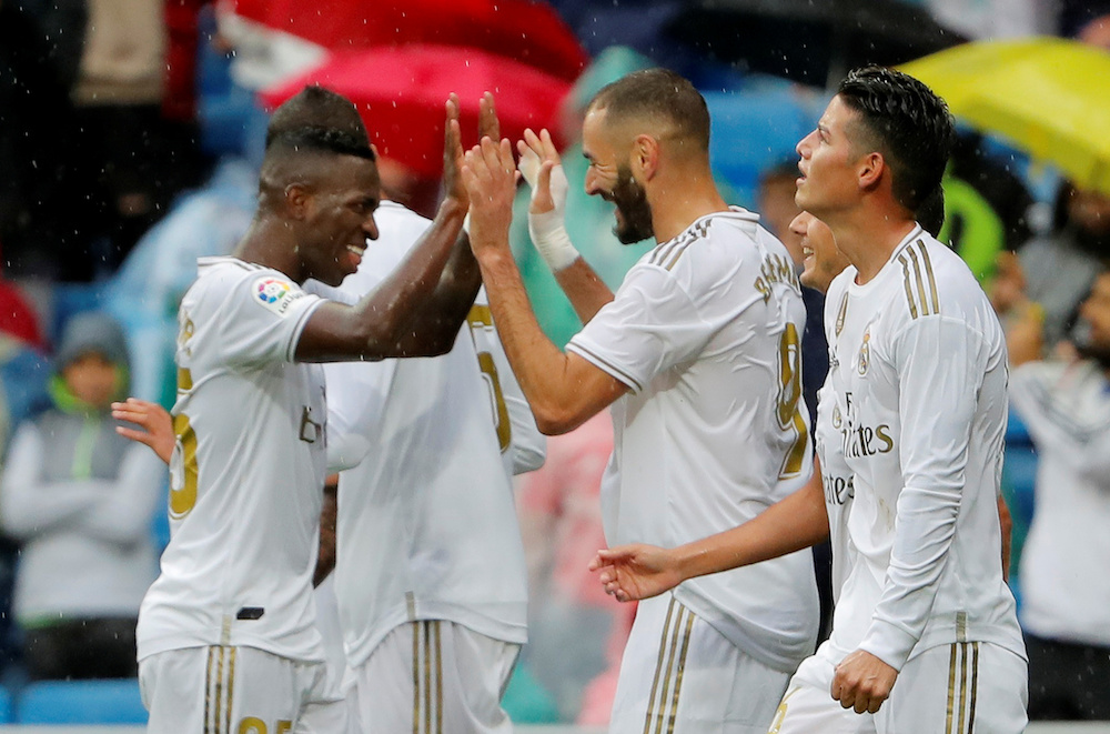 Real Madridu00e2u20acu2122s Karim Benzema celebrates scoring their second goal with Vinicius Junior and James Rodriguez at the Santiago Barnebeau Stadium in Madrid, September 14, 2019. u00e2u20acu201d Reuters pic