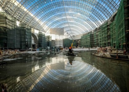 A worker rides on a machine through water at the under construction giant indoor amusement park u00e2u20acu02dcIsland of Dreams.u00e2u20acu2122 u00e2u20acu201d Reuters picnn