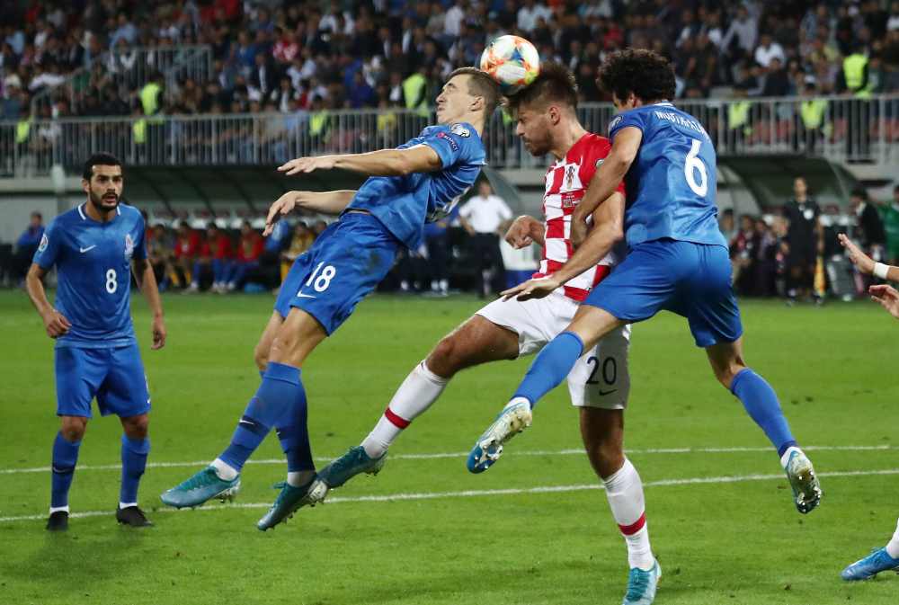 Croatia's Bruno Petkovic in action with Azerbaijan's Anton Krivotsyuk and Bahlul Mustafazade,  September 9, 2019. u00e2u20acu2022 Reuters pic 