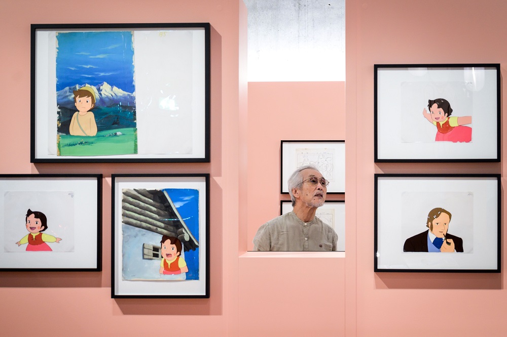 Japanese animator and character designer Yoichi Kotabe looks on behind cartoon boards from the Japanese animated series ‘Heidi: A Girl of the Alps’ during his visit to an exhibition titled ‘Heidi in Japan’ at the Swiss National Museum in Zurich August 31, 2019. — AFP pic    